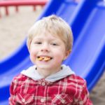 boy eating cracker - image for teaching daycare kids about food safety