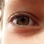 importance of eye contact with kids - article image of child's eye close up
