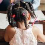 child writing - preschool journaling article image