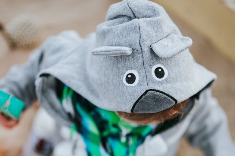 top of kid's head wearing hoodie sitting down - image for circle time ideas article
