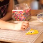 fine motor skills used in beading art - image for article on pediatric occupational therapy need