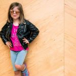 girl posing confidently - article image for building self awareness in early childhood