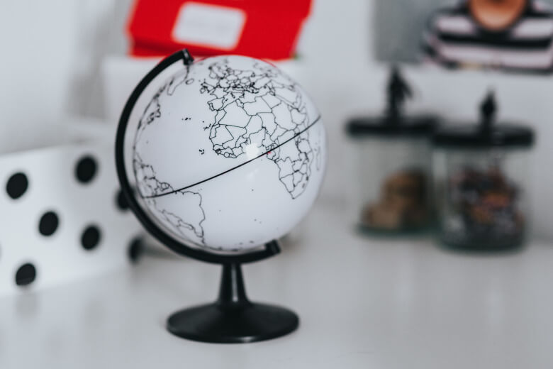 Simple globe with countries on table - teaching preschool geography article image