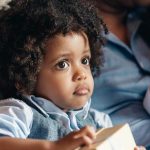 toddler child looking and thinking - article image on how to teach manners to preschool children