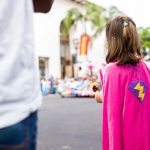imagination games ideas article featured image of girl with superhero cape