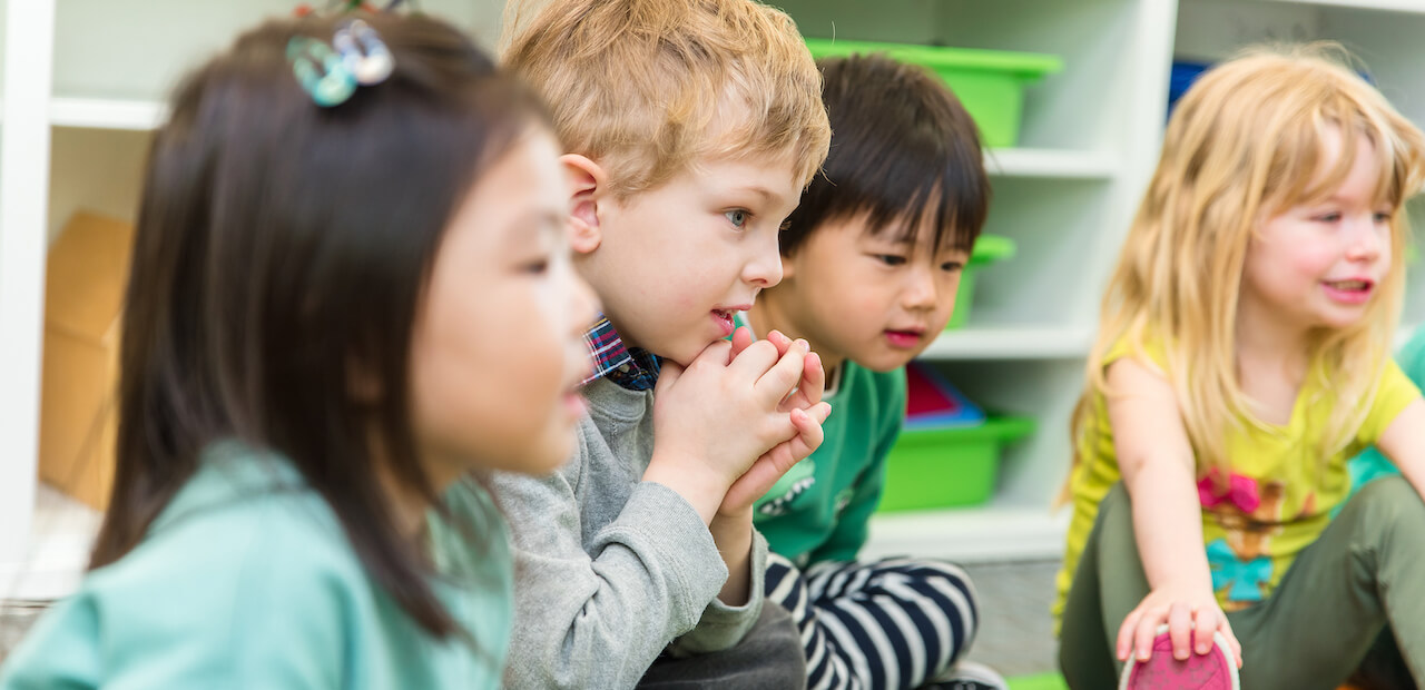 children engaged during group time at daycare