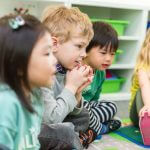 children engaged during group time at daycare