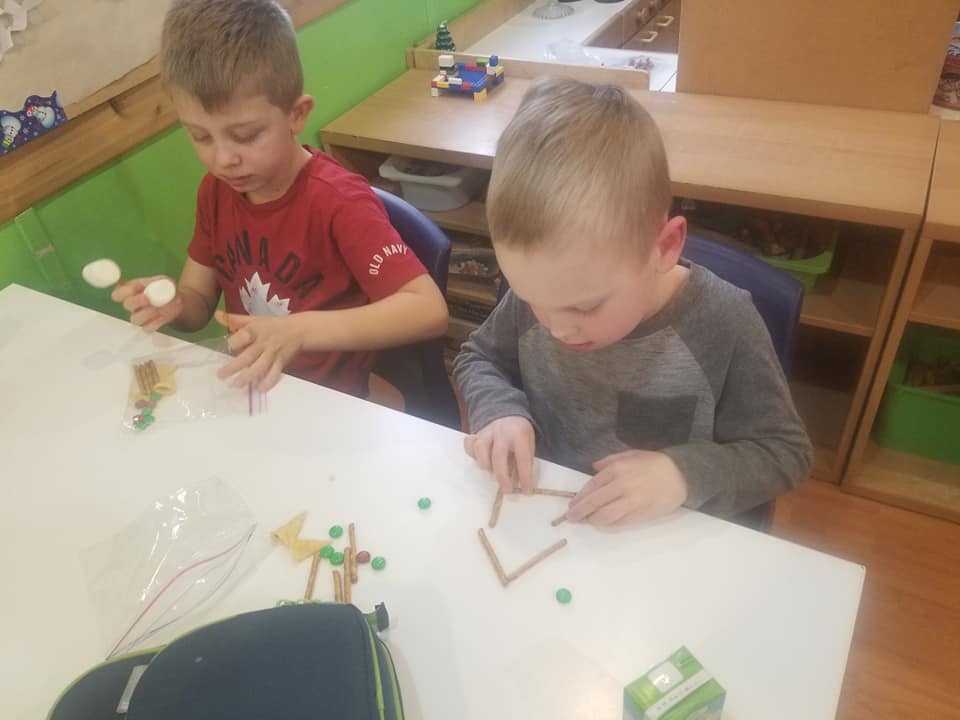 pretzel sticks to make marshmallow snowman at daycare