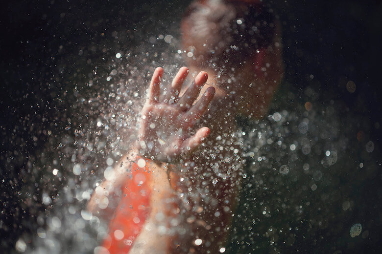 teach impulse control early childhood article image - boy splashing water showing hand