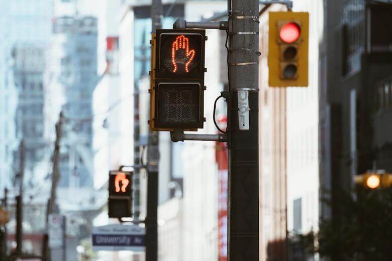 teach preschool road safety article image of cross walk sign and traffic light